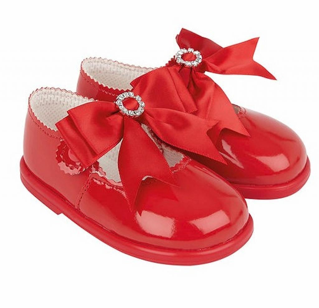 Hard soles red bow shoes