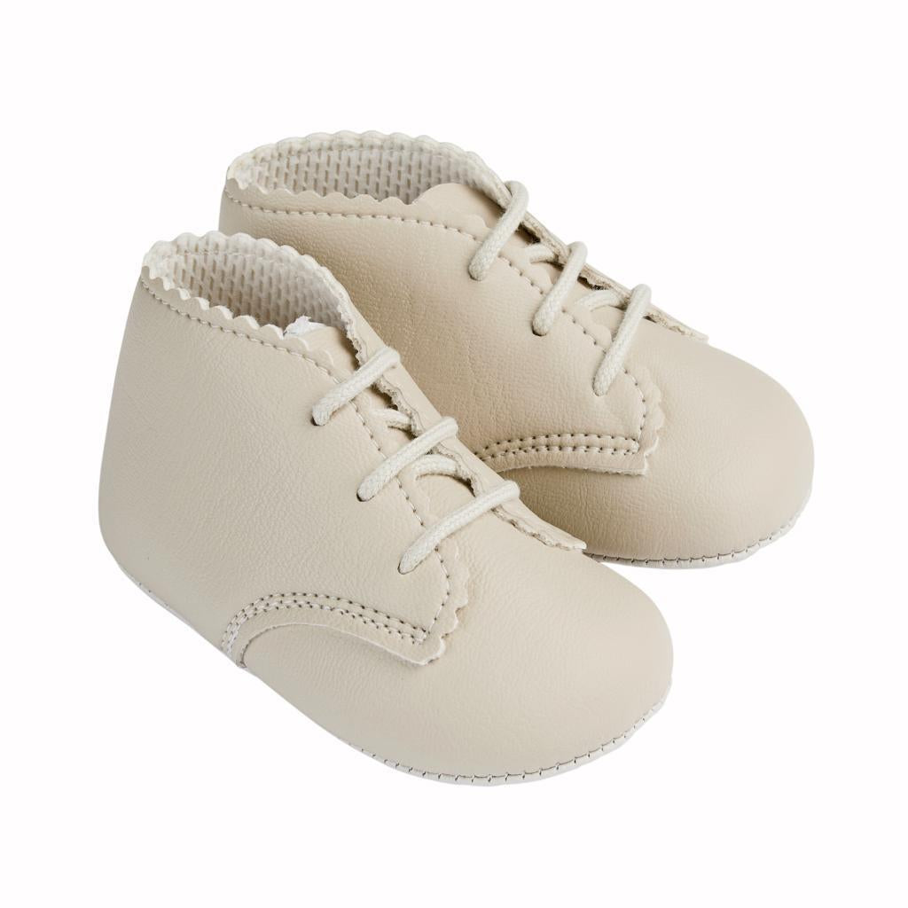 Beige soft soled shoes