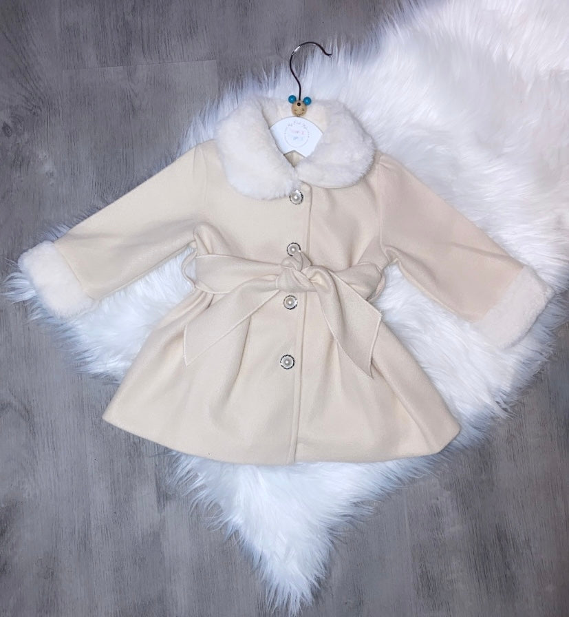 Beige fur coat